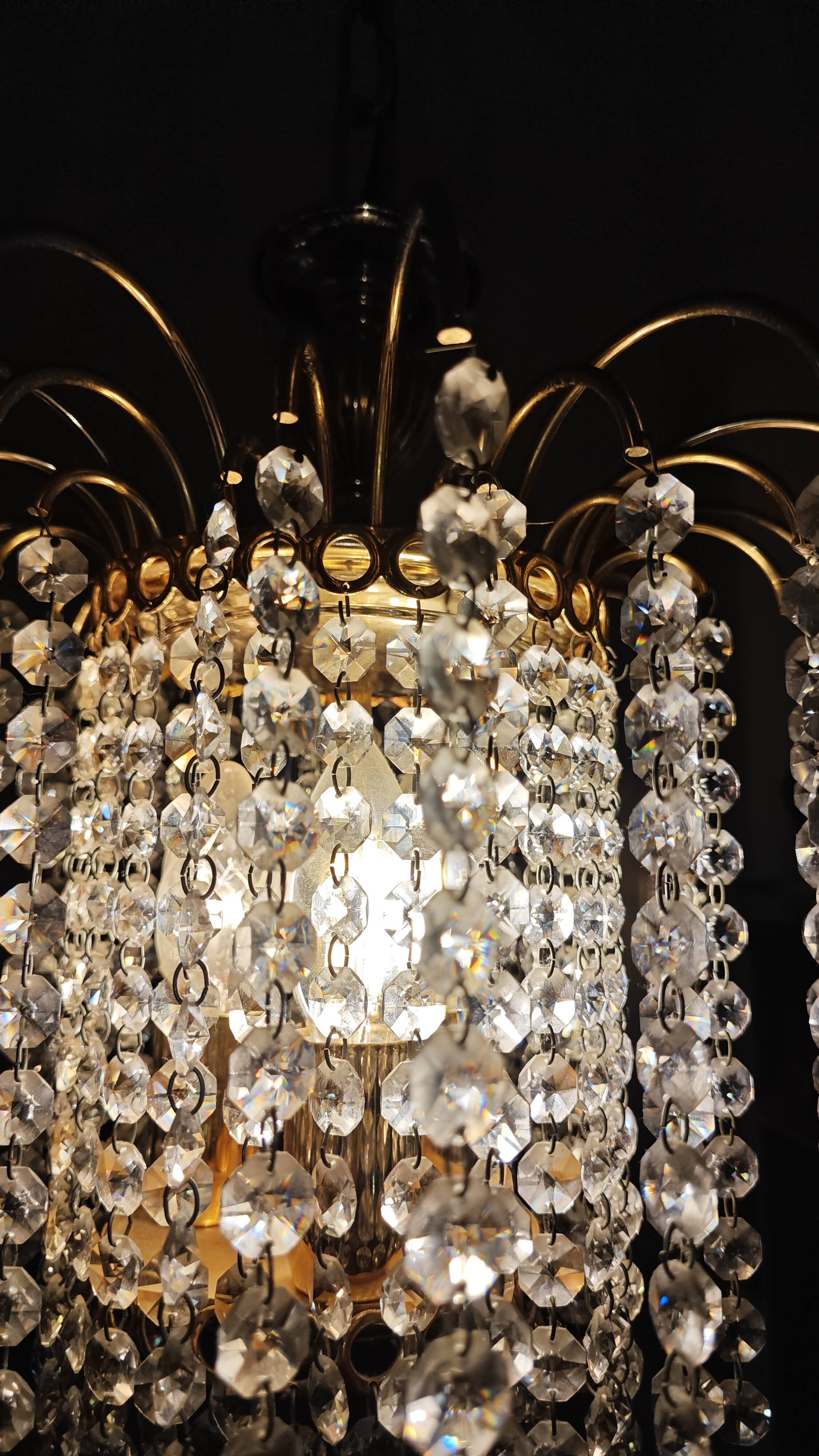 Brass cascading chandelier with crystals