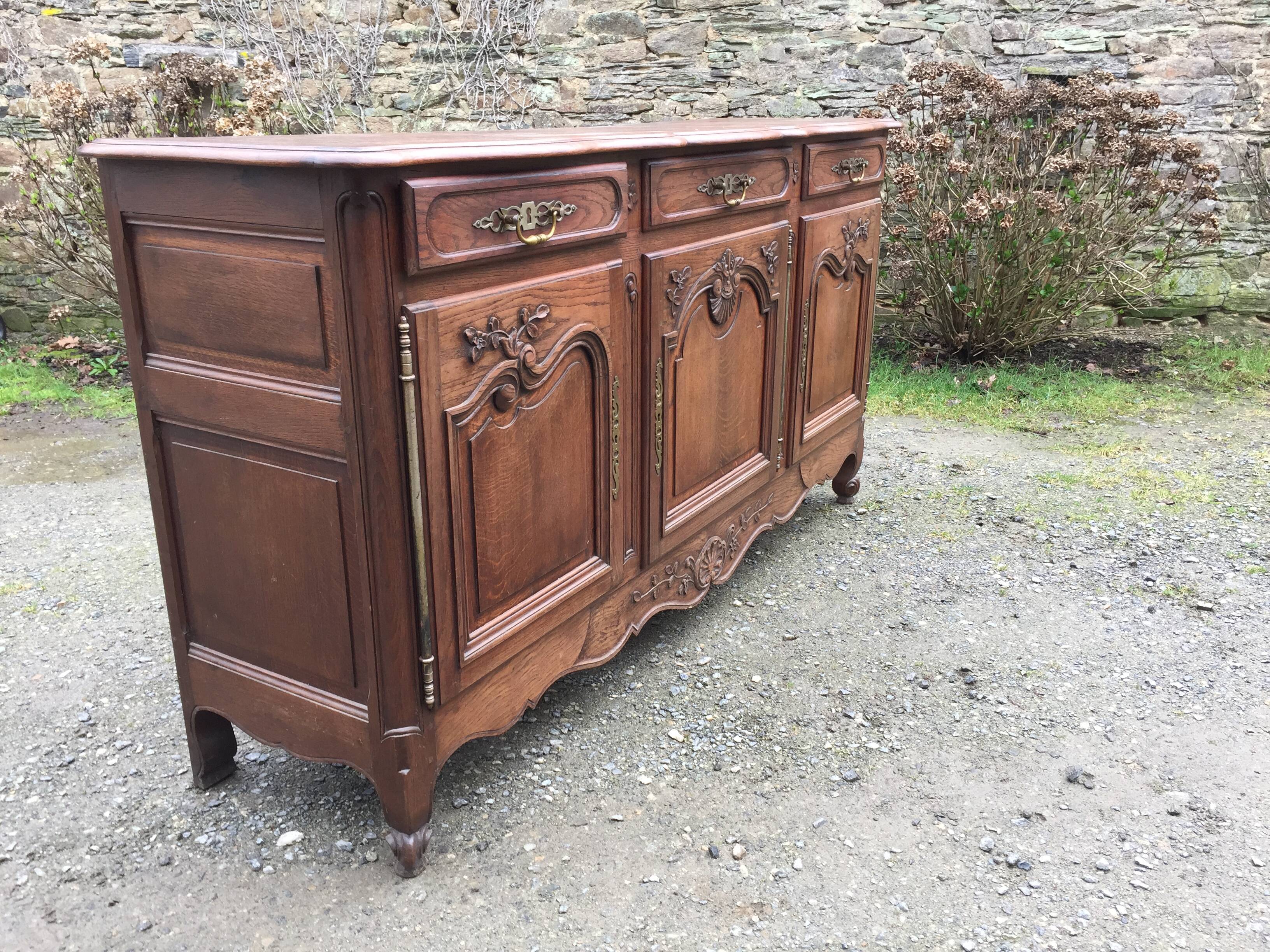 Louis XV sideboard in solid oak carved with 3 doors and 3 drawers