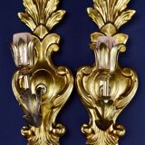 Pair of walled carved wood wall lamps