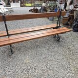 Antique double garden bench from the city of Paris in cast iron and wood