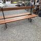 Antique double garden bench from the city of Paris in cast iron and wood