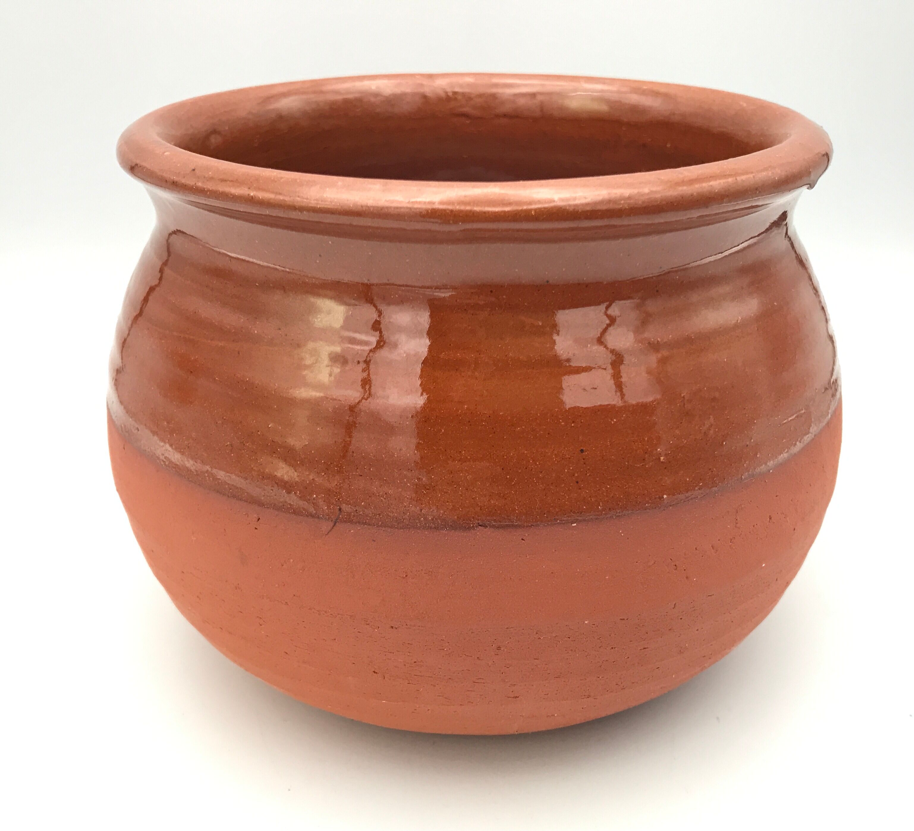 Matt and glazed round earthenware pot