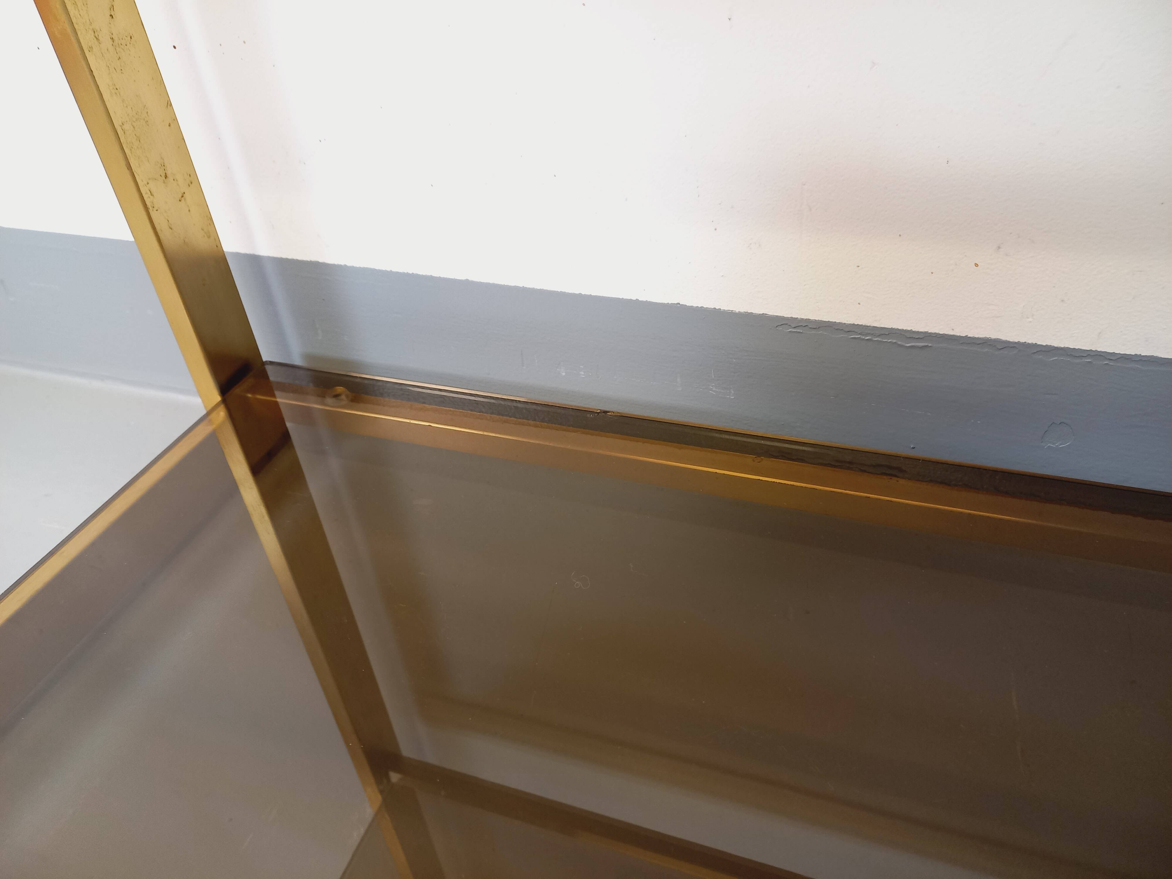 Artelano vintage bookcase shelves in gold metal smoked glass from the 70s