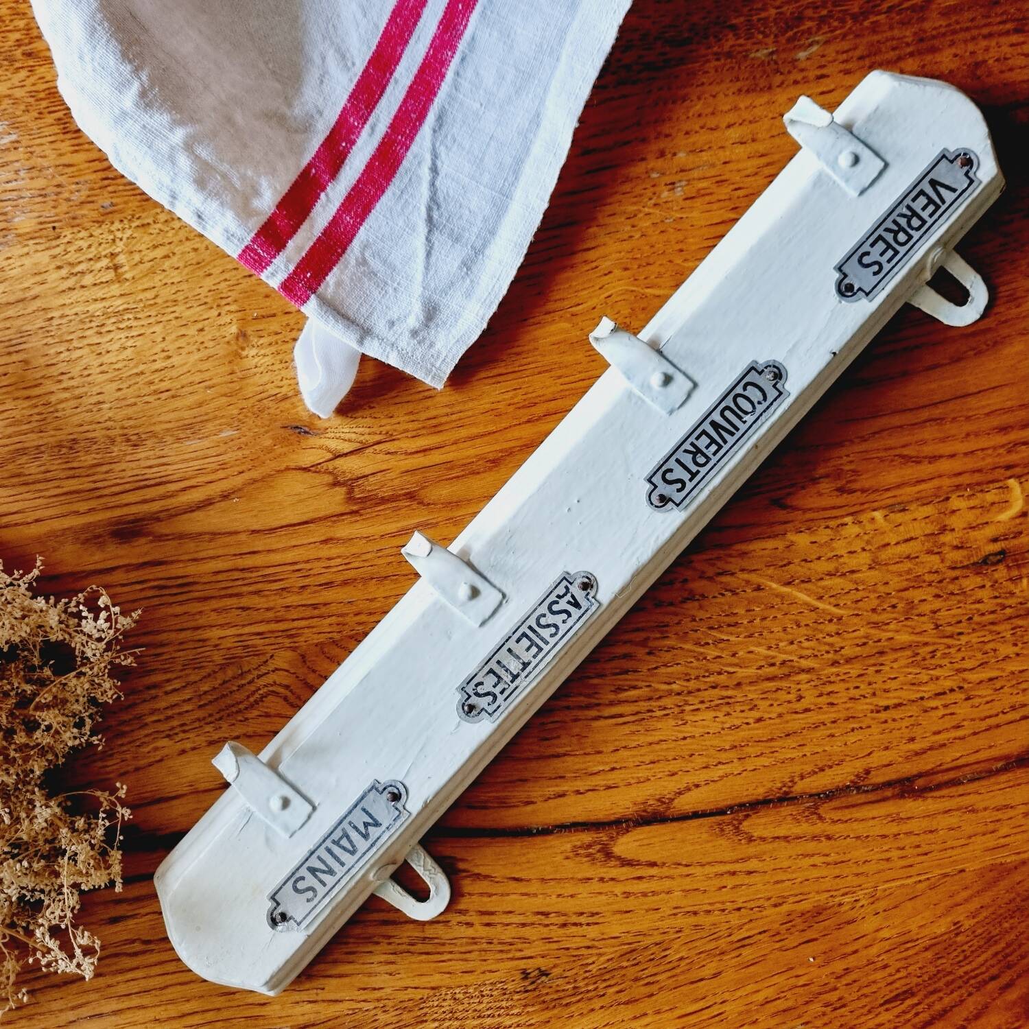 Old coat hook tea towel holder