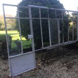 Old glass roof with door and window