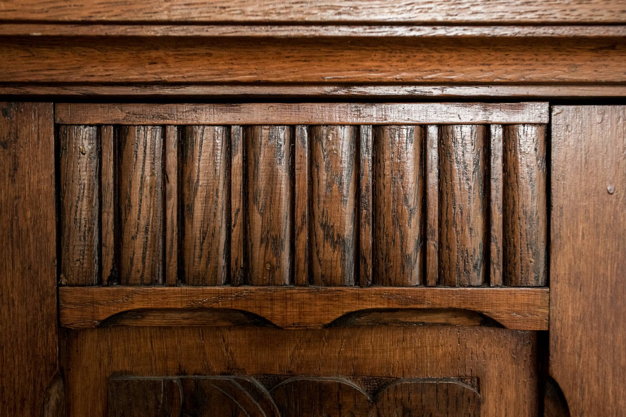 Old solid wood wardrobe with three vintage mirror doors