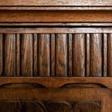 Old solid wood wardrobe with three vintage mirror doors