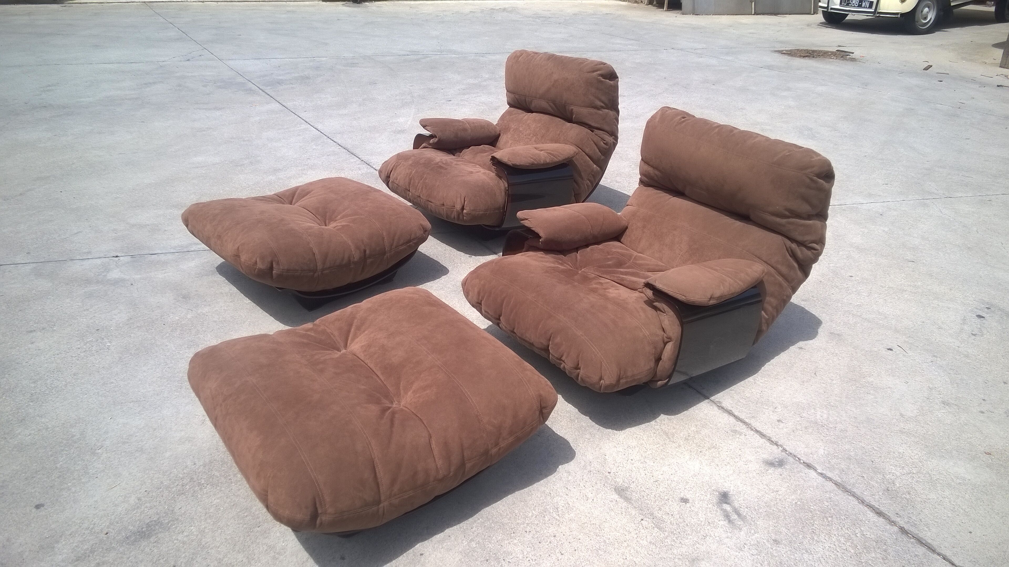 Armchairs and foot rest by Michel Ducaroy for Ligne Roset