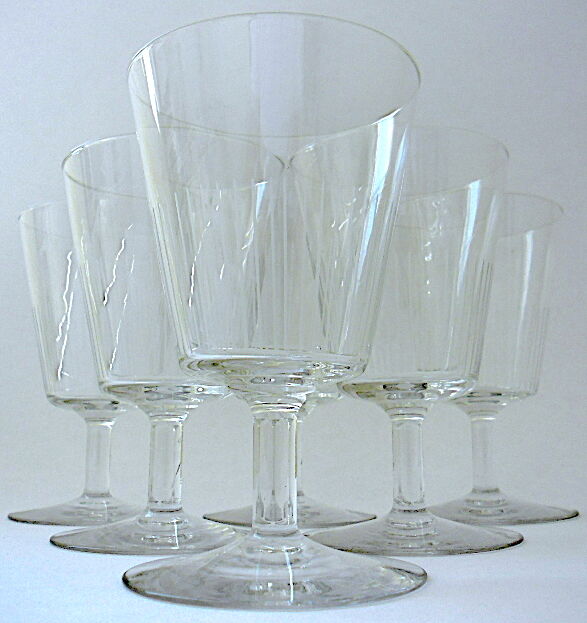 Suite of six art-deco glasses with red wine in modernist shape in cut crystal
