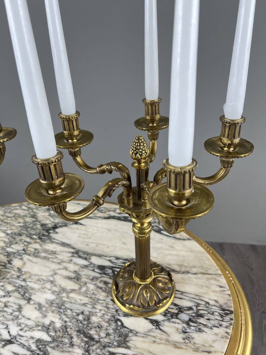 Pair of gilded bronze candelabra with 5 lights, Louis XVI style, 20th century.