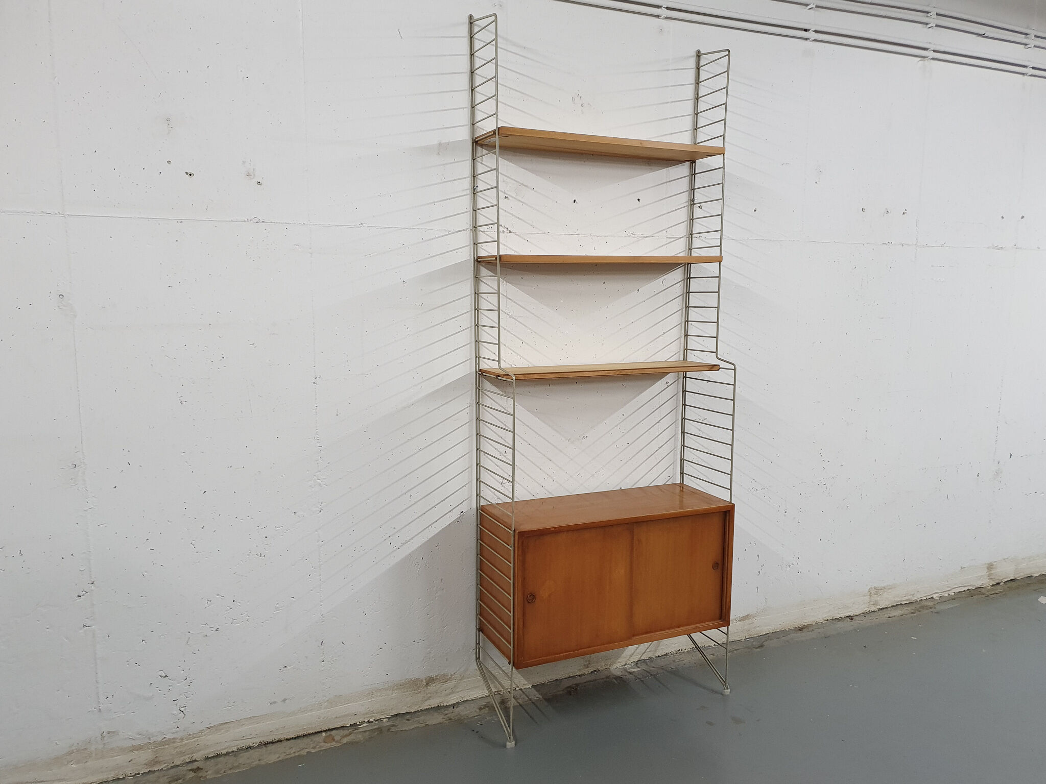 Pinewood wall unit by Nils “Nisse” Strinning for String, Sweden 1950's