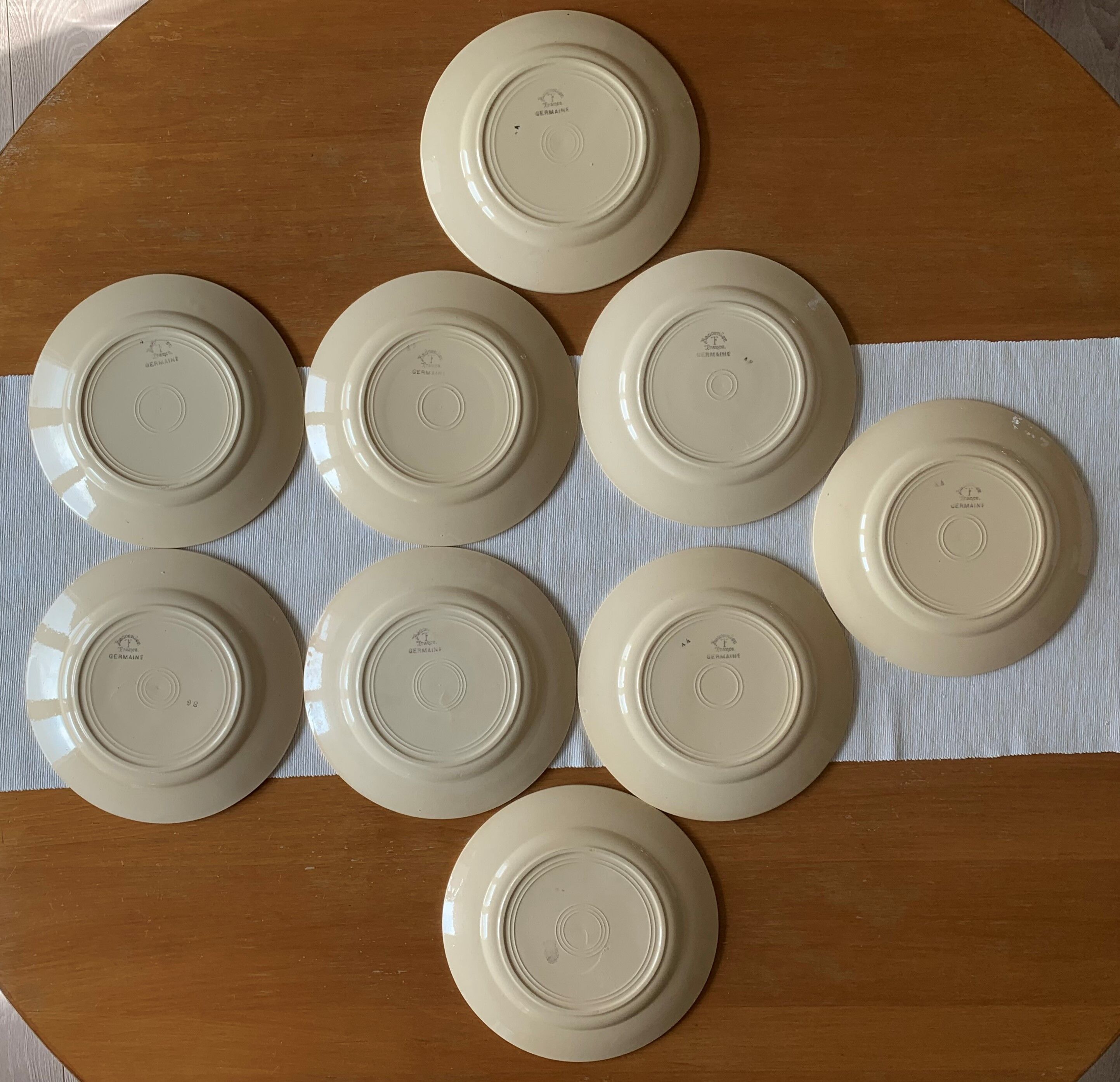 9 flat antique earthenware plates from badonviller