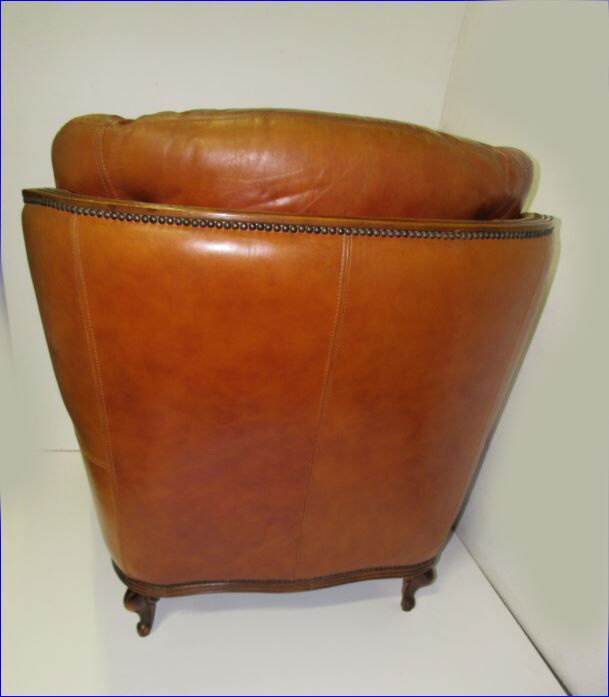 Louis XV style tawny leather chair