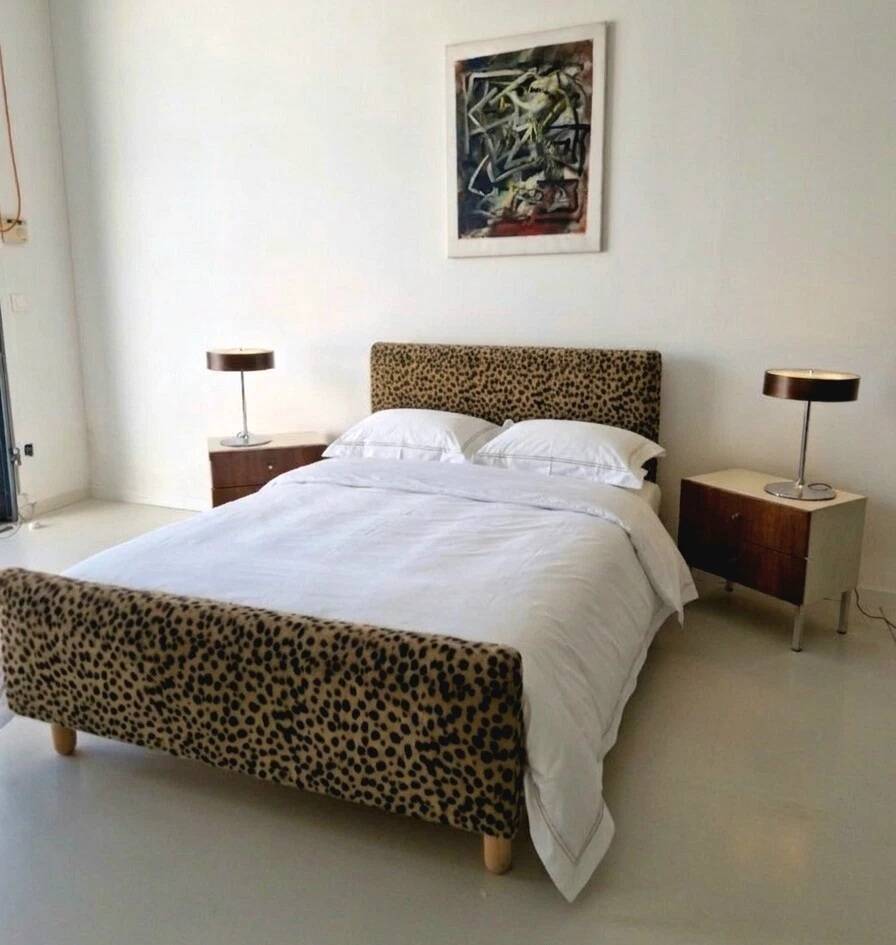 Vintage leopard print bed frame, Hollywood Regency style.