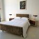 Vintage leopard print bed frame, Hollywood Regency style.