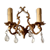 Rococo-style wall lamp in gilded bronze and crystal stamps