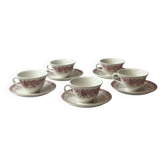Set of 5 cups and saucers Sarreguemines with red rose decoration.