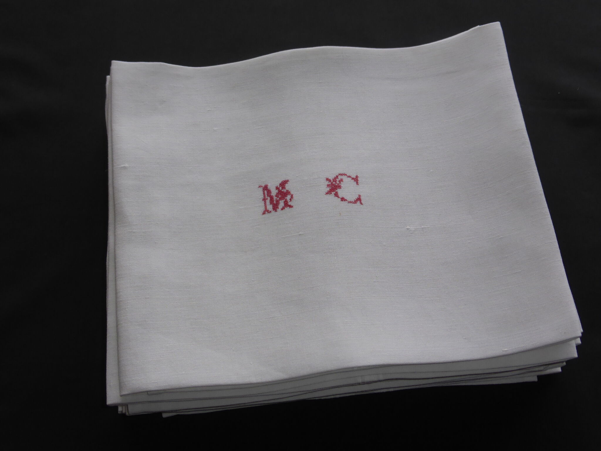 9 old linen towels embroidered MC with red thread
