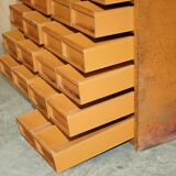 Industrial metal chest of drawers with 30 drawers.