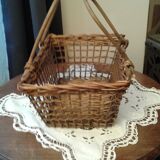 Basket has two handles in rattan