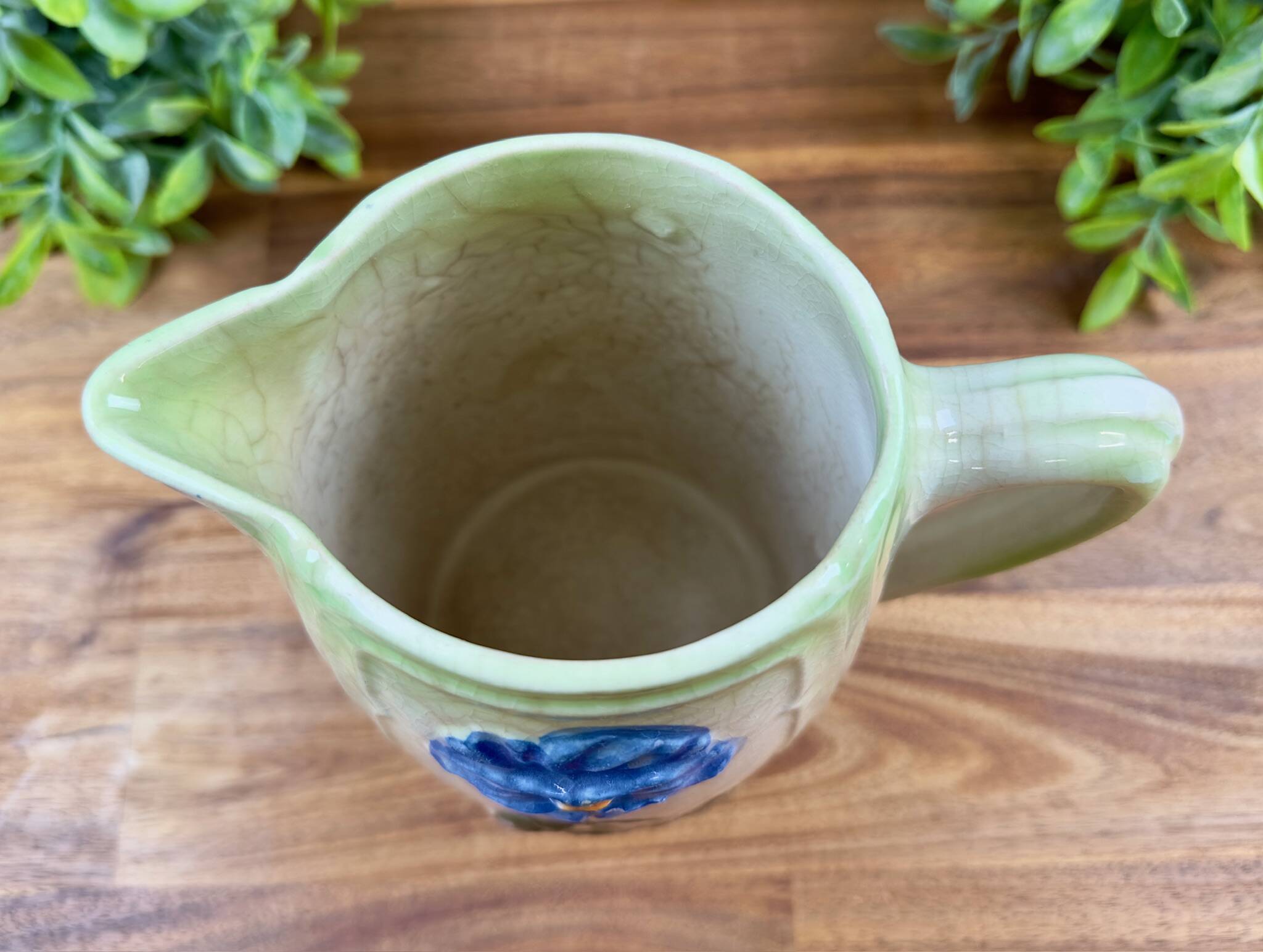 Vintage blue floral ceramic pitcher.