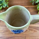 Vintage blue floral ceramic pitcher.