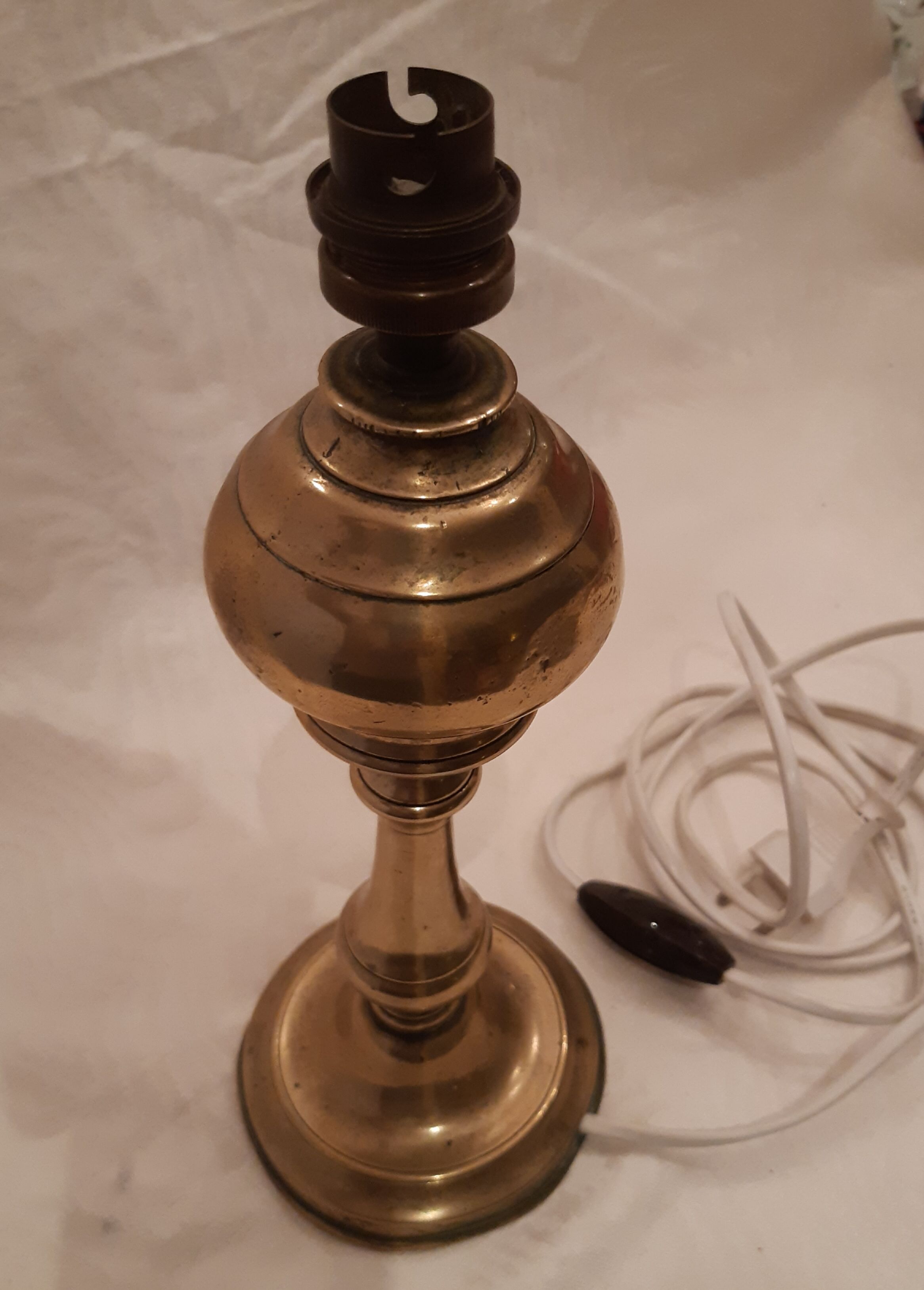 Old lamp foot in electrified brass