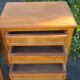 Pair of walnut bedside tables in Louis XVI style with brass inlay.