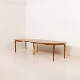 Henning Kjaernulf attributed extra large teak table with 4 inner leaves for Soro, Denmark 1960s