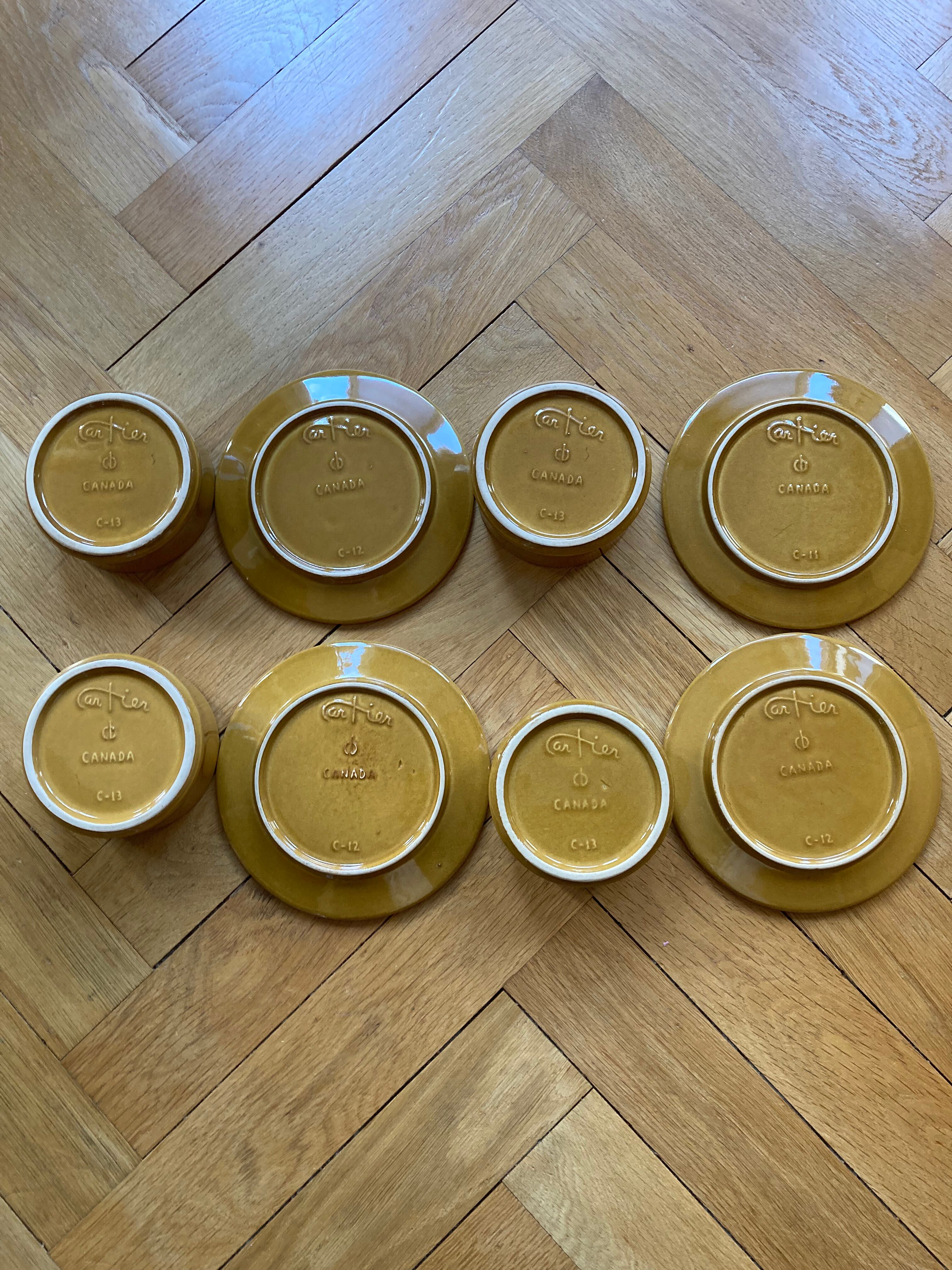 Bowls and ceramic plates from Beauce by Jean Cartier