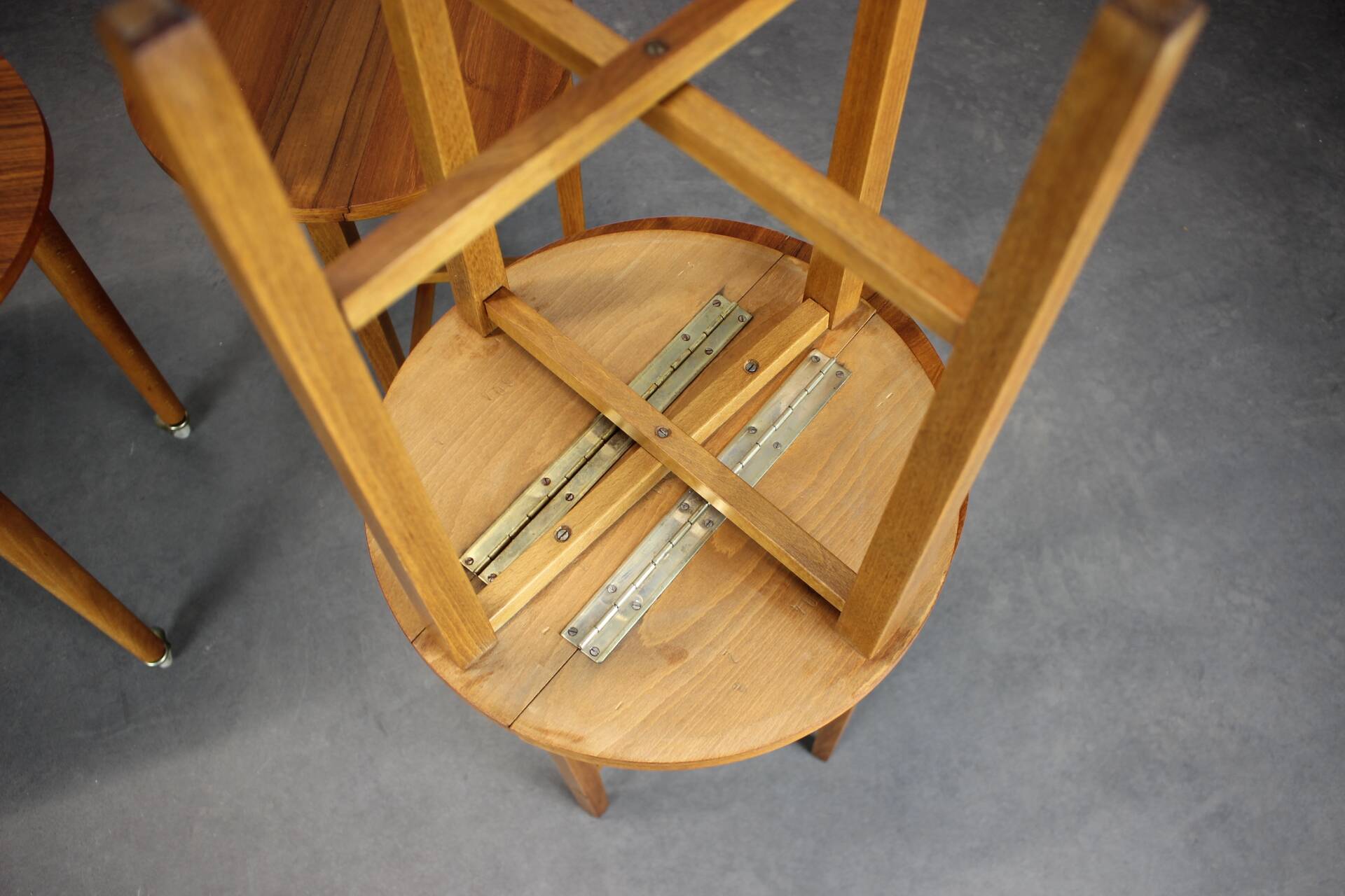 Restored Danish folding teak table with three nesting chairs by Poul Hundevad