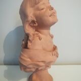 Girl bust signed Bastet in terracotta