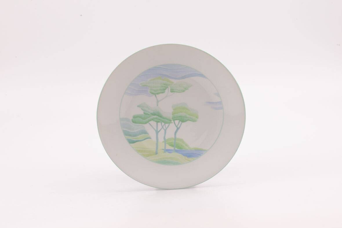 Set of 7 porcelain plates Lourioux Deshoulières - dessert, plates and deep bowls.