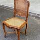 2 Louis XV style chairs in solid oak with rush seating from La Meublerie Meulin.