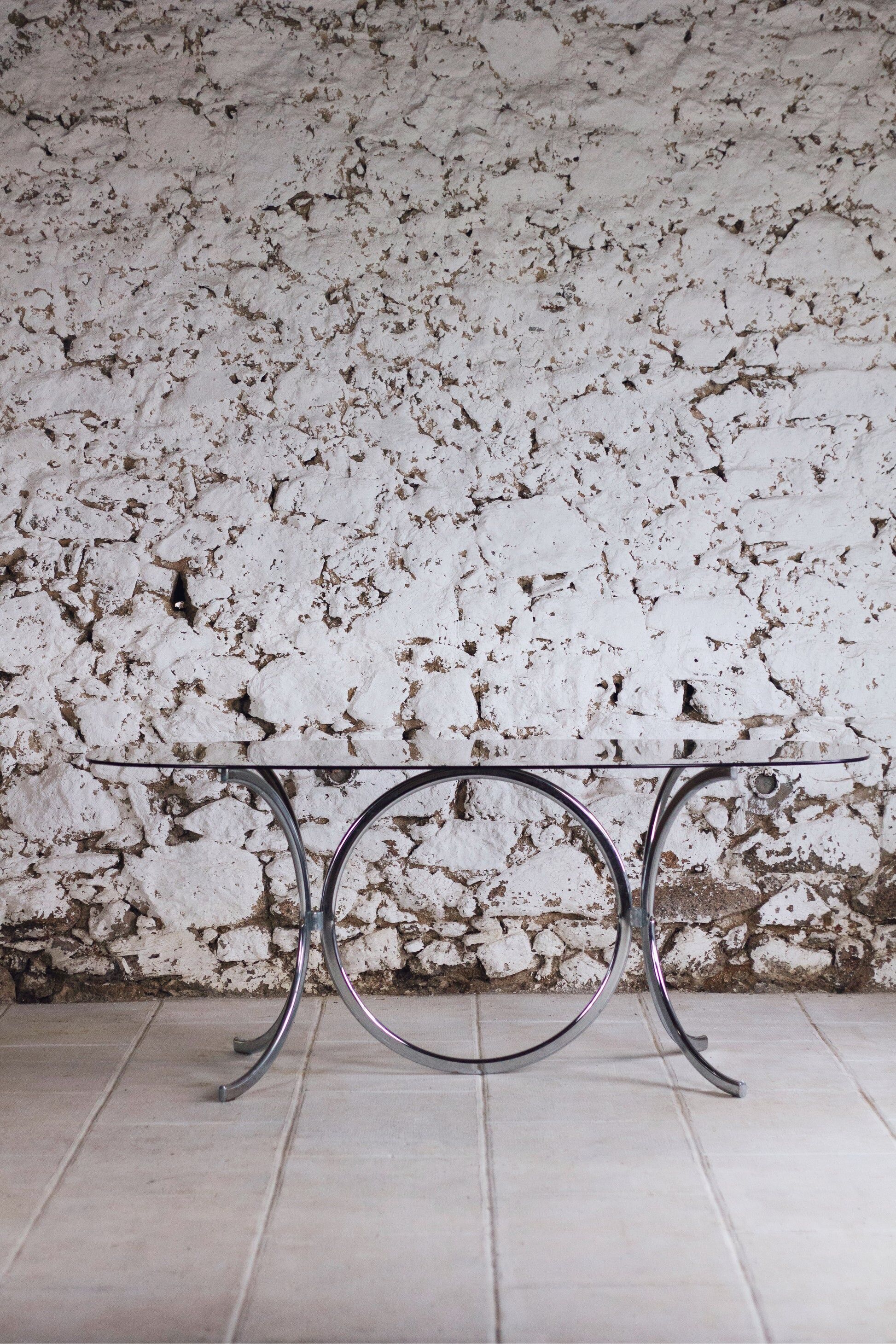 Chrome and smoked glass dining table in the style of Gastone Rinaldi, 1970.