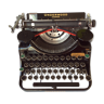 Machine à écrire ancienne Underwood portable Champion/Typewriter de 1935.