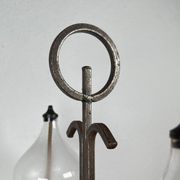 Mid-century Danish wrought iron and glass table oil lamp, 1960s.