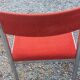 Pair of designer chairs in chrome metal and orange velvet from the 1970s.