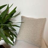 Off-white beige velvety effect cushion