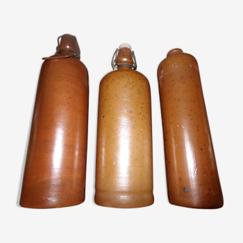 Set of 3 bottles in brown sandstone
