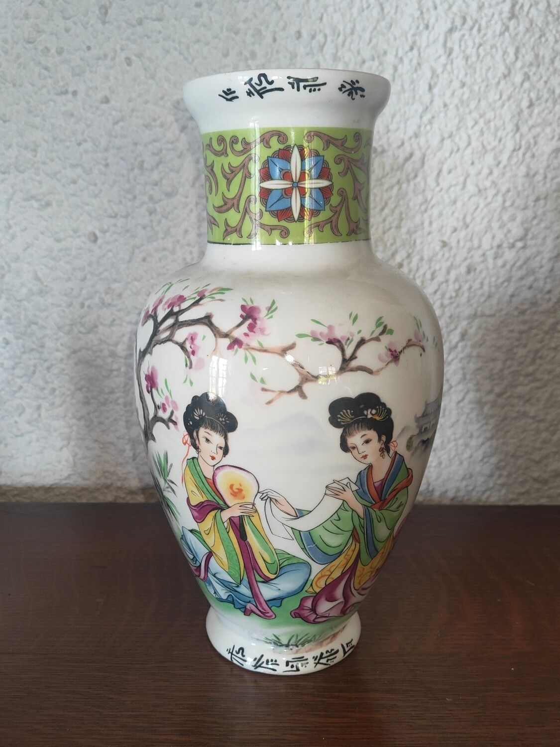 Japanese porcelain vase decorated with 2 geishas and flowering trees