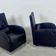 Pair of aubergine leather club armchairs by Cinna.