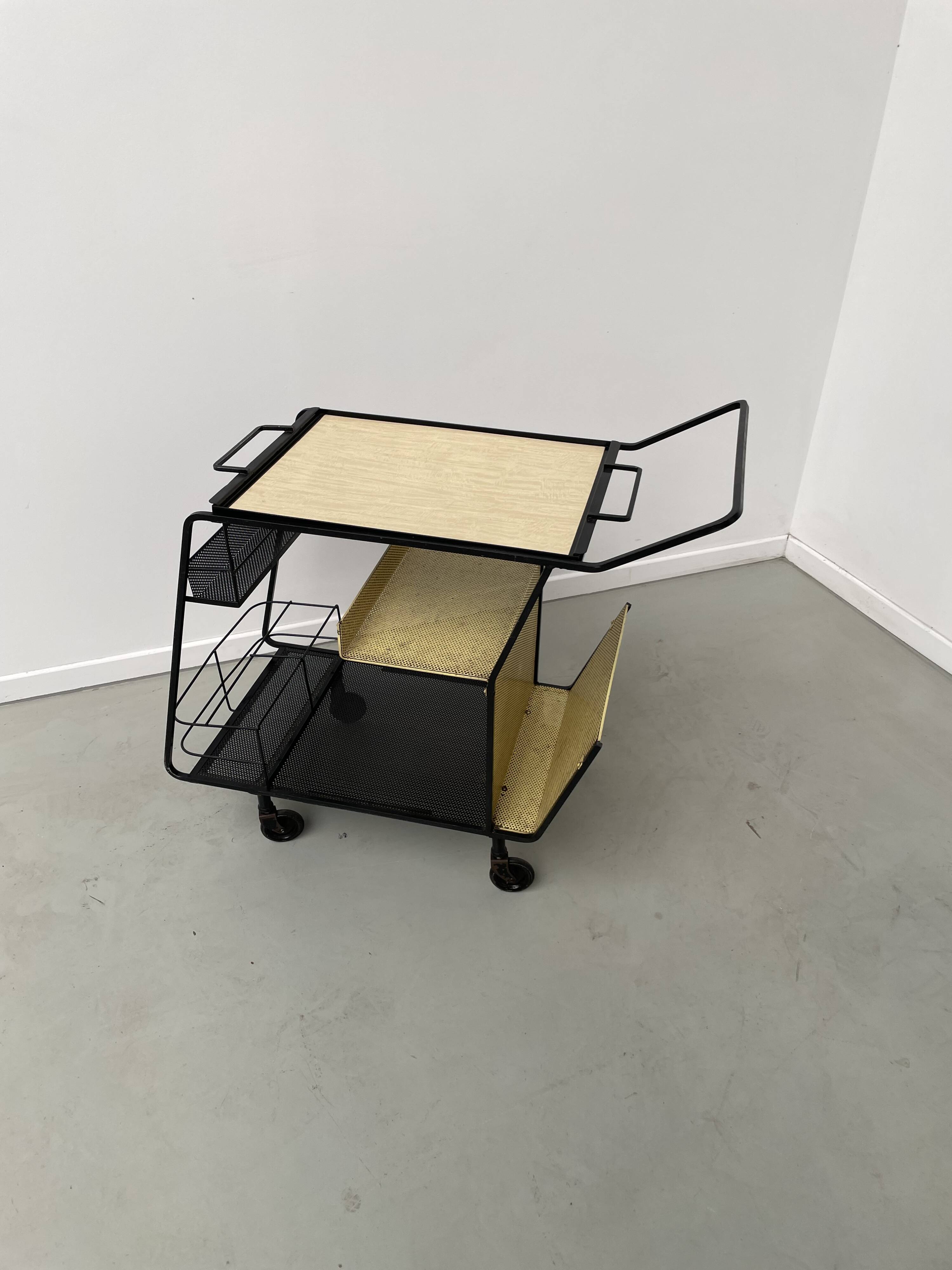 Perforated metal serving trolley in the Mathieu Matégot style