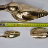 Set of three brass ducks