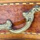Commode style Louis XV en loupe d'orme et noyer