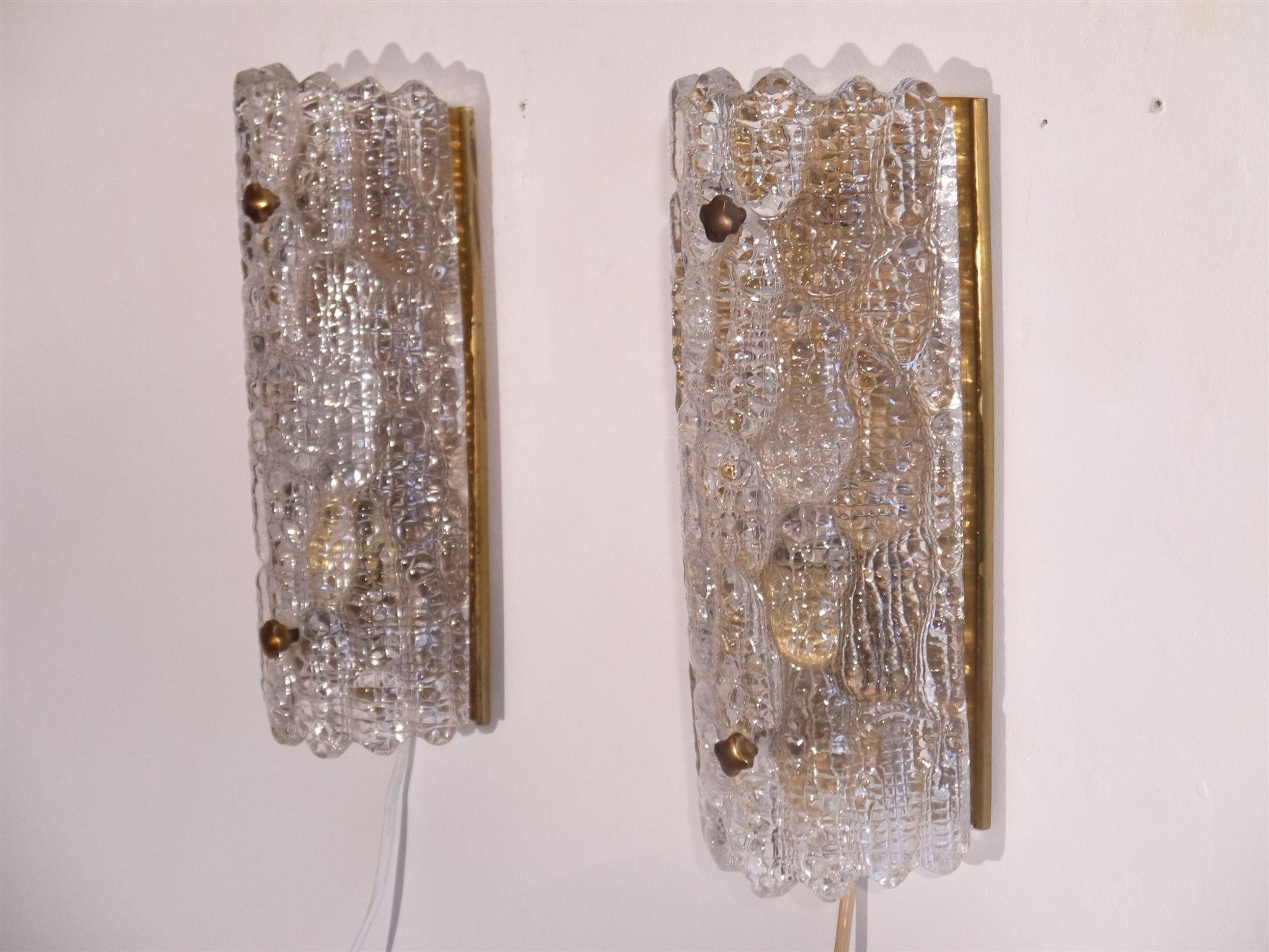 Pair of brass and crystal appliques by Carl Fagerlund for Orrefors