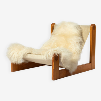 Brutalist sling lounge chair in canvas, pine and sheepskin, Belgium, 1970s