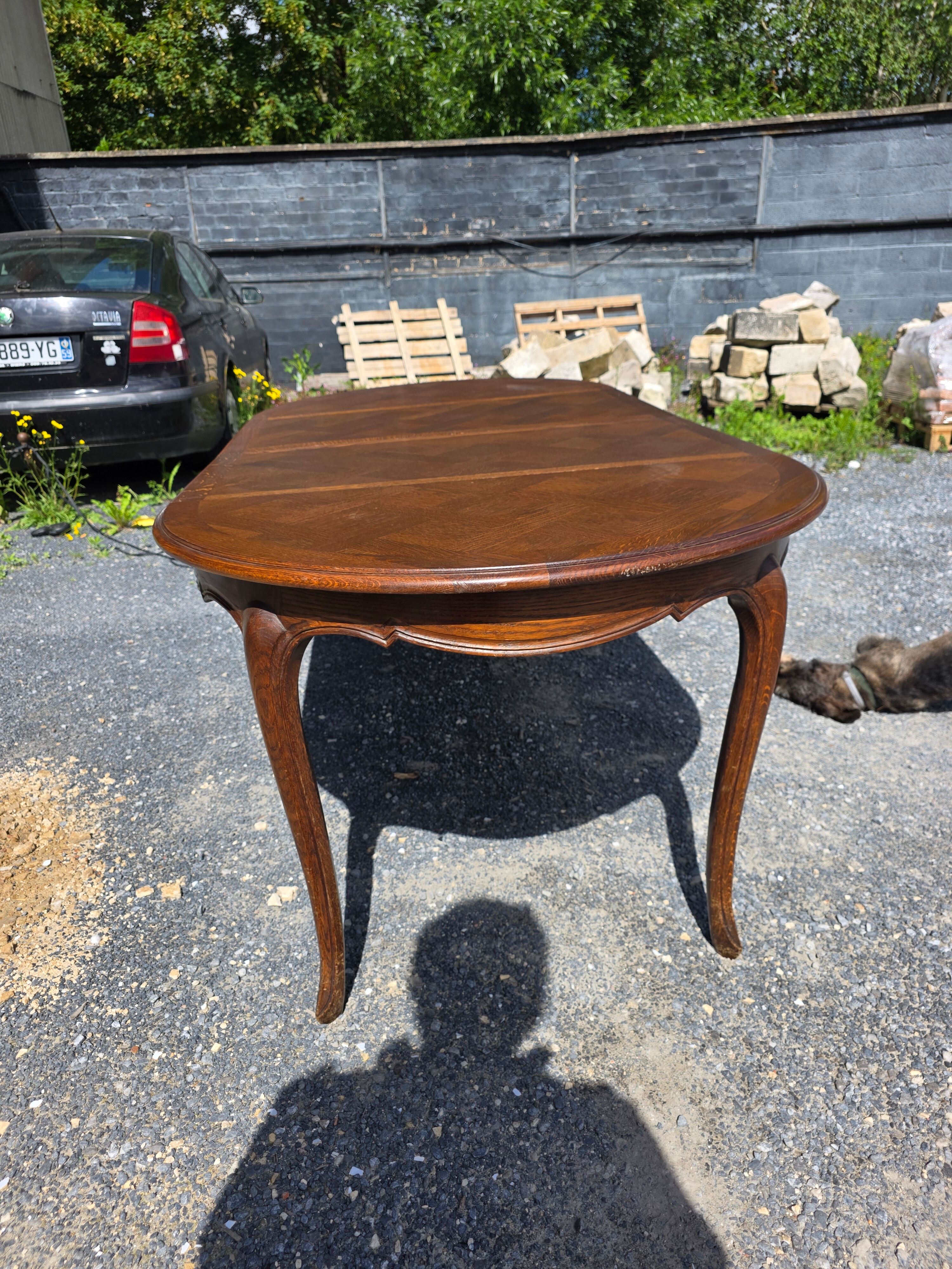 Extendable table in Louis XV style in oak (2 extensions)