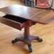 Drop-leaf table in rosewood