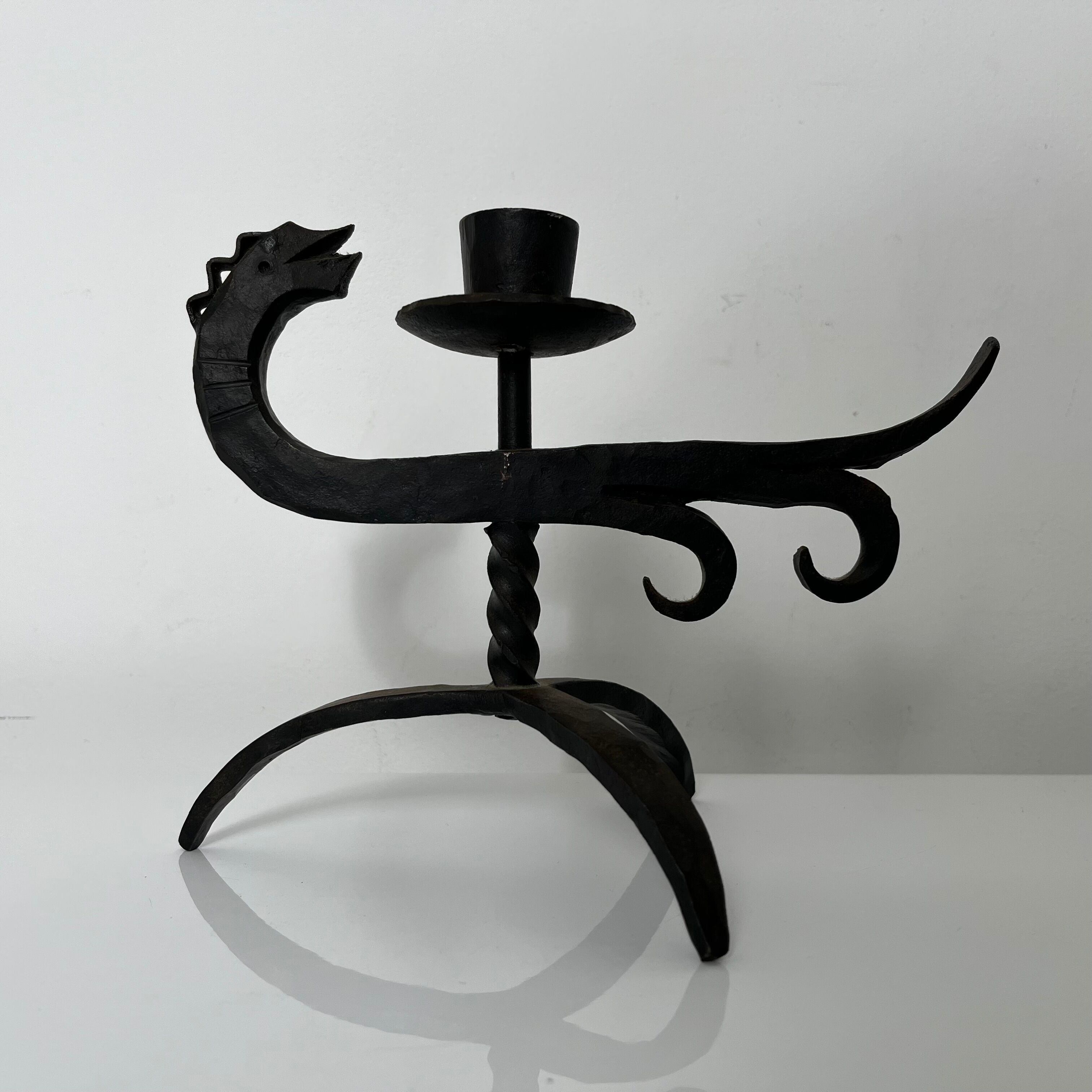 Zoomorphic dragon candle holder in wrought iron